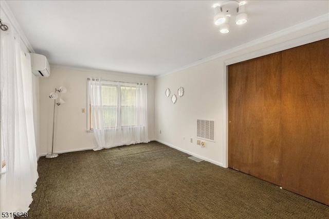 interior space with crown molding and a wall mounted AC