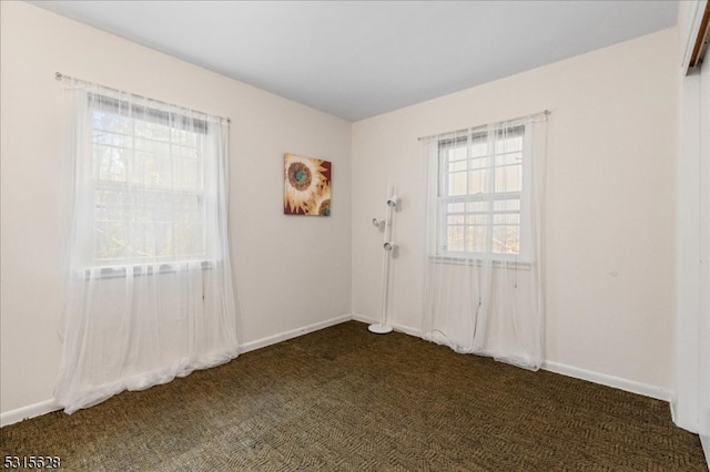 view of carpeted spare room