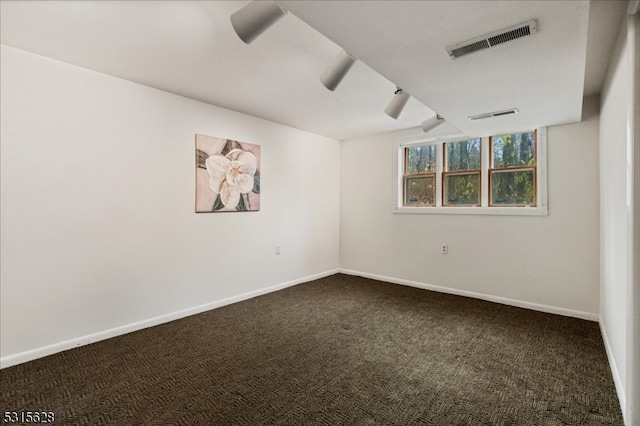 unfurnished room featuring carpet flooring