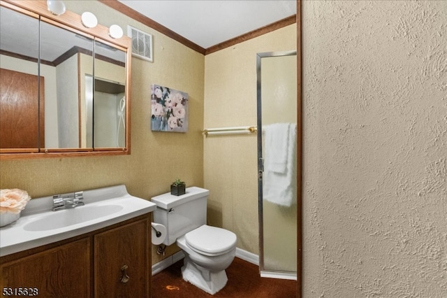 bathroom featuring crown molding, vanity, and toilet