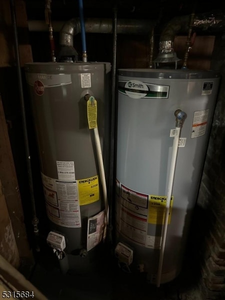 utility room featuring water heater