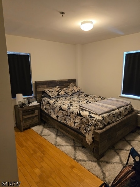 bedroom with light hardwood / wood-style flooring