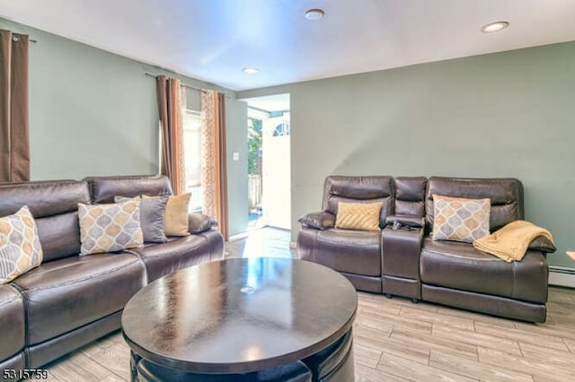 living room with light hardwood / wood-style flooring