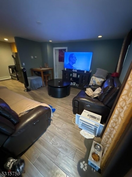 living room with light hardwood / wood-style flooring