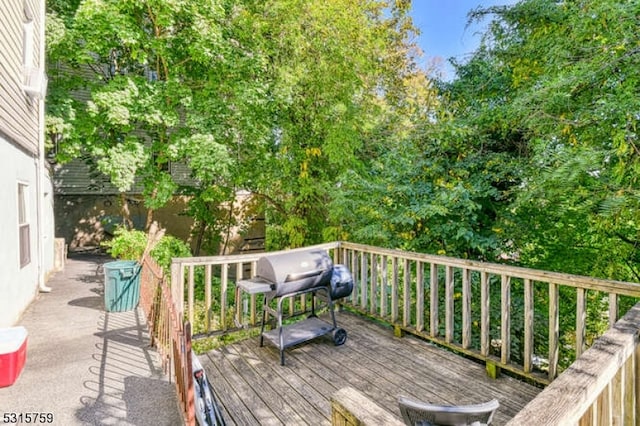 wooden terrace with grilling area