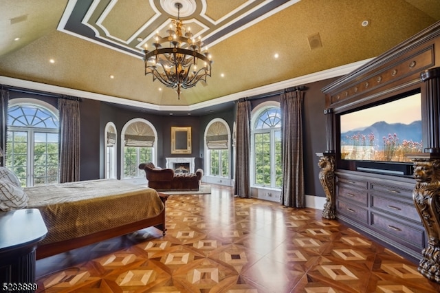 bedroom featuring an inviting chandelier, crown molding, and dark parquet floors