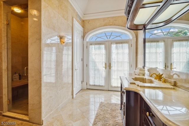 doorway featuring crown molding, french doors, and plenty of natural light