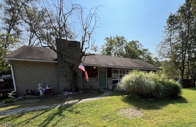 ranch-style house with a front yard