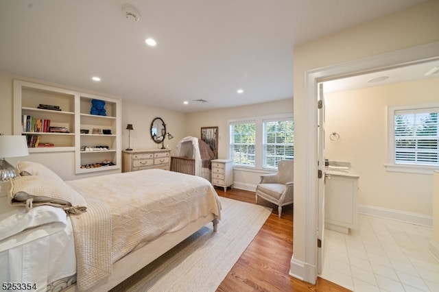 bedroom featuring light wood-type flooring