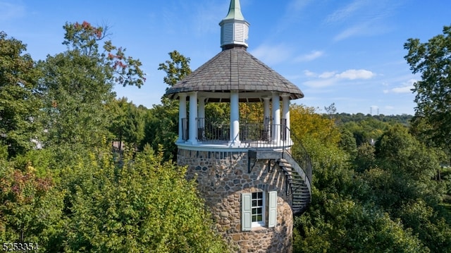 view of home's exterior featuring a gazebo