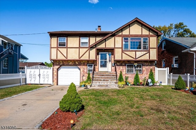 tudor-style house with a front lawn and a garage