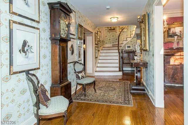 living area with hardwood / wood-style floors