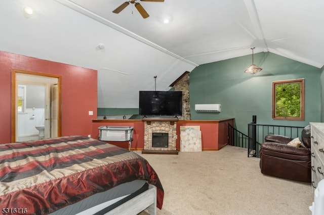 bedroom featuring connected bathroom, vaulted ceiling, ceiling fan, and light colored carpet