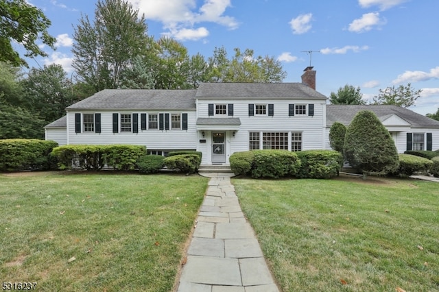 view of front of home with a front yard