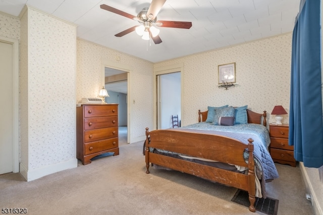 bedroom with light colored carpet and ceiling fan