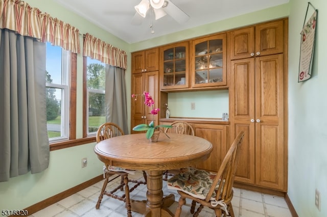 dining space featuring ceiling fan