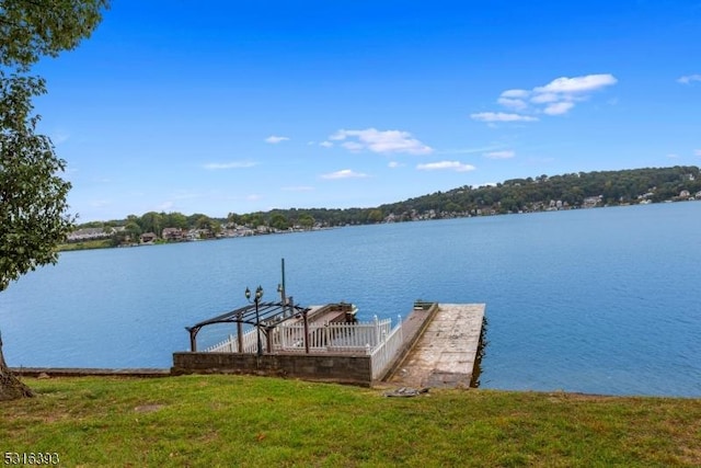 view of dock featuring a water view
