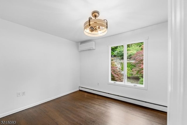 empty room featuring wood finished floors, baseboards, baseboard heating, a chandelier, and an AC wall unit