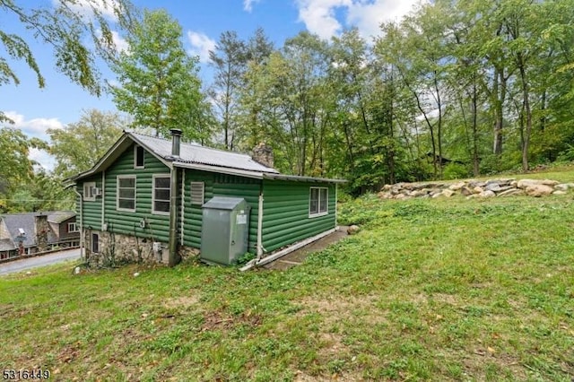 exterior space with a yard