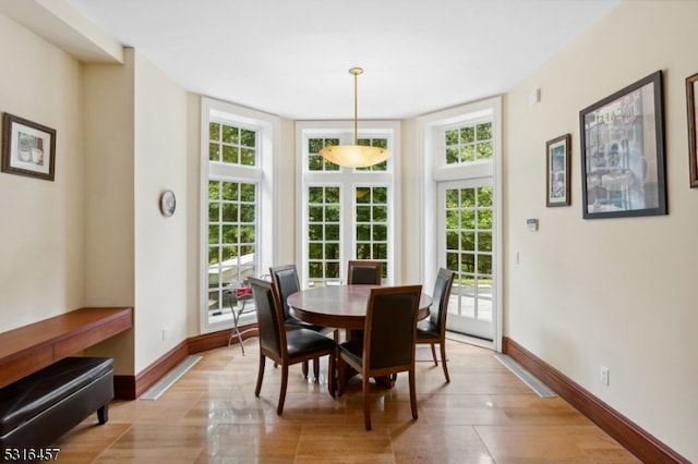 dining area featuring a healthy amount of sunlight