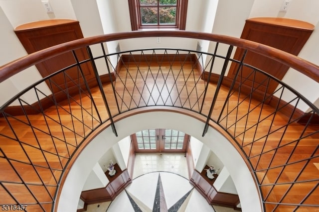 stairway with french doors