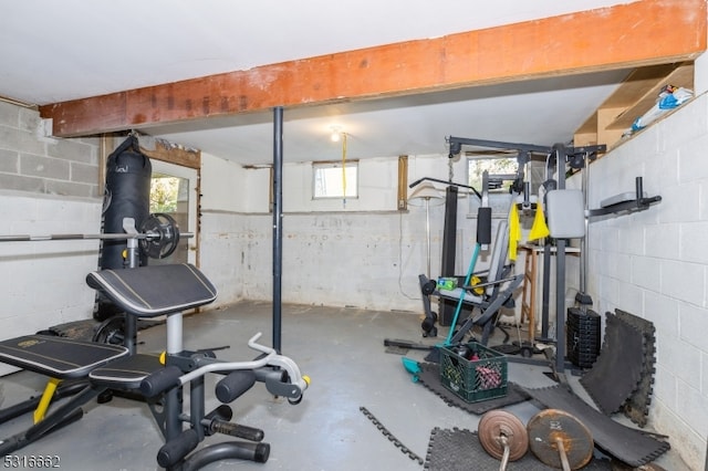 exercise area featuring concrete floors