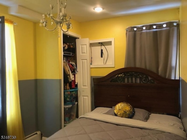 bedroom featuring a chandelier