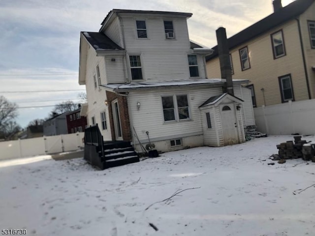 view of snow covered property