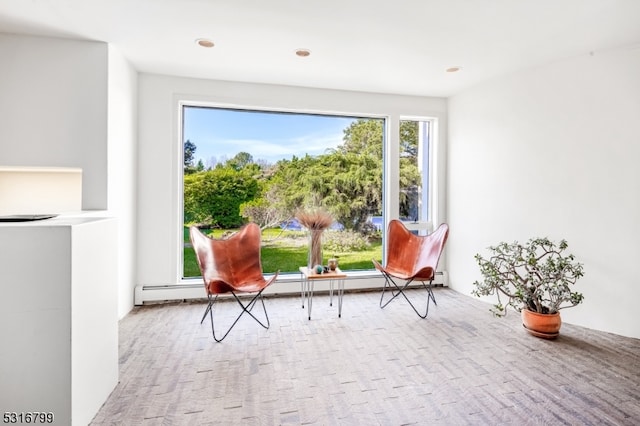 interior space featuring light carpet and a baseboard radiator