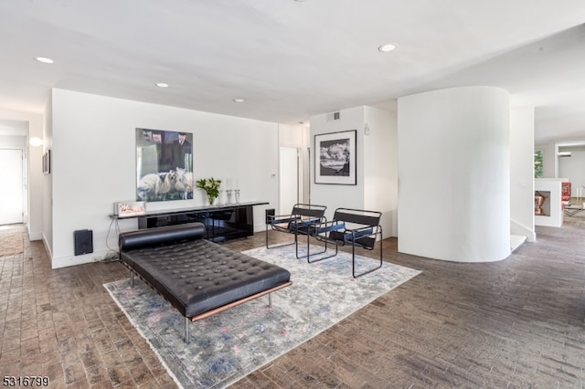 living room featuring dark wood-type flooring