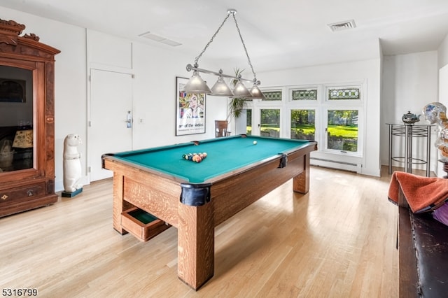 rec room with billiards, a baseboard radiator, and light hardwood / wood-style flooring