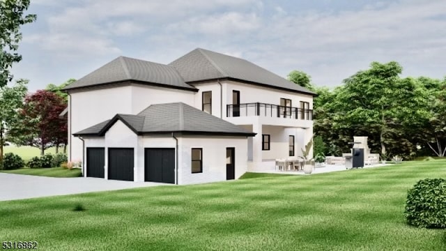 rear view of house featuring a balcony, a lawn, and a patio area