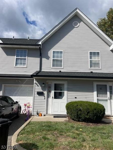 4 Star Lake Rd Unit D, Bloomingdale Boro, NJ 07403 - view of front facade featuring a garage