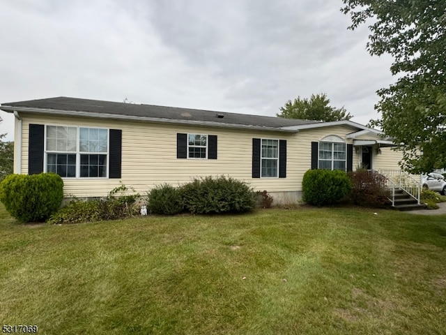 exterior space with a front lawn