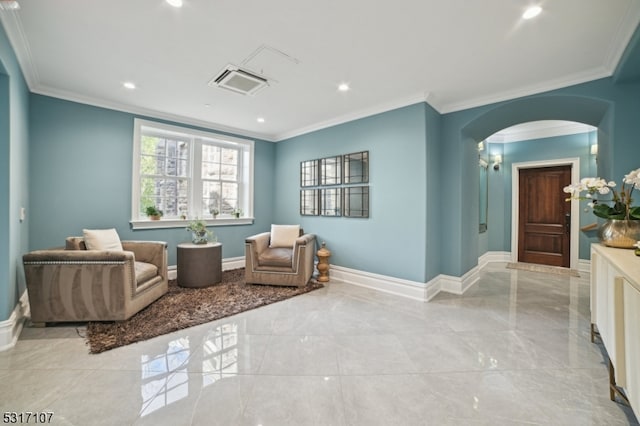 sitting room featuring ornamental molding