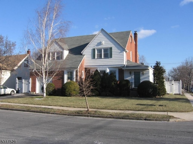 view of front of home with a front lawn