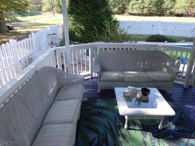 wooden deck featuring fence