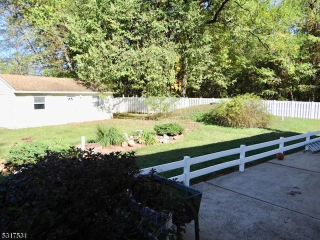 view of yard with a patio area and fence