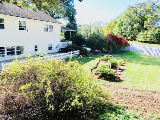 view of yard with fence