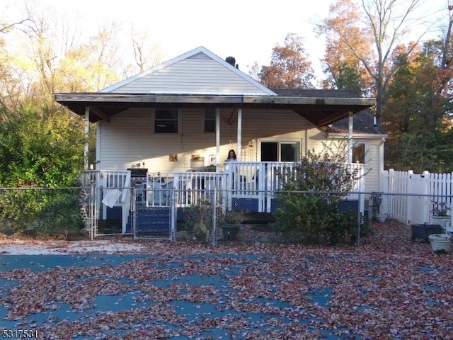 exterior space with a gate and fence