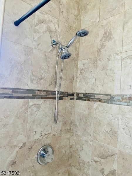 details featuring a tile shower