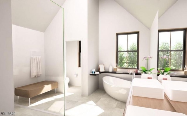 bathroom featuring a bath and high vaulted ceiling