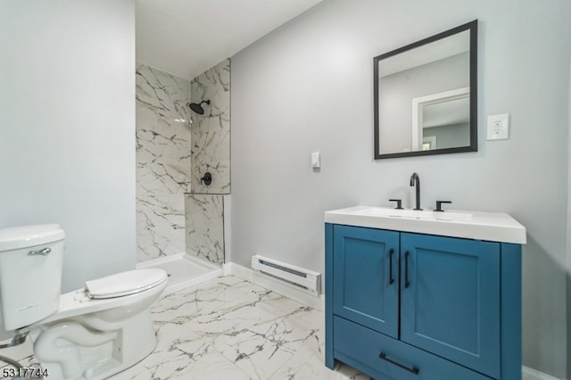 bathroom featuring a tile shower, vanity, toilet, and baseboard heating