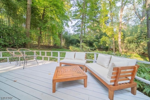 deck featuring outdoor lounge area