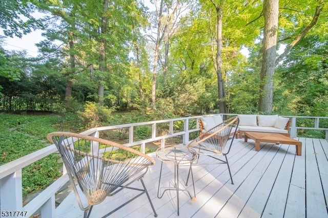 deck with an outdoor hangout area