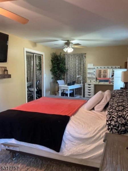 bedroom featuring access to exterior and ceiling fan