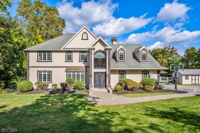 view of front of home featuring a front lawn