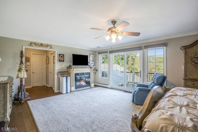 bedroom with ceiling fan, crown molding, and multiple windows