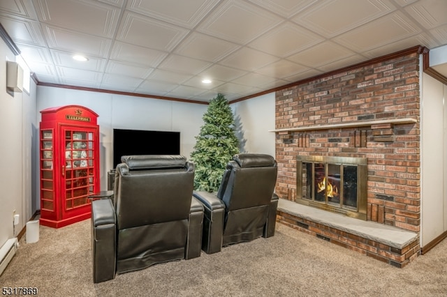 living room featuring a fireplace, carpet, and baseboard heating