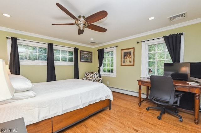 bedroom featuring ornamental molding, ceiling fan, light hardwood / wood-style floors, and baseboard heating